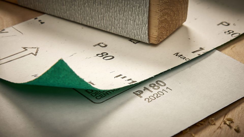 2 types of sandpaper under sanding block