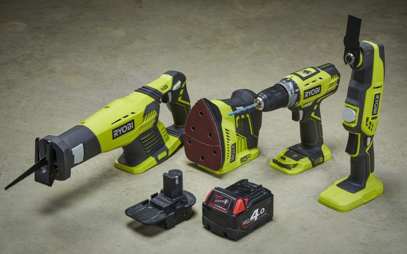 Four cordless tools behind Badaptor and batteries