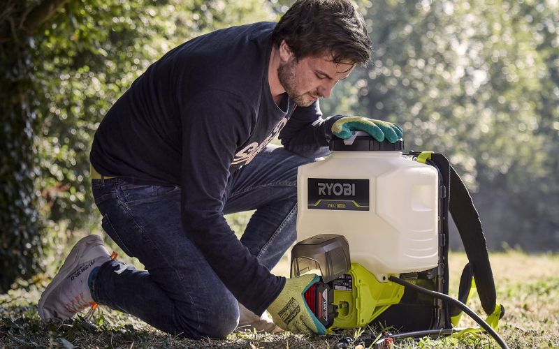 Inserting Badaptor into weed sprayer