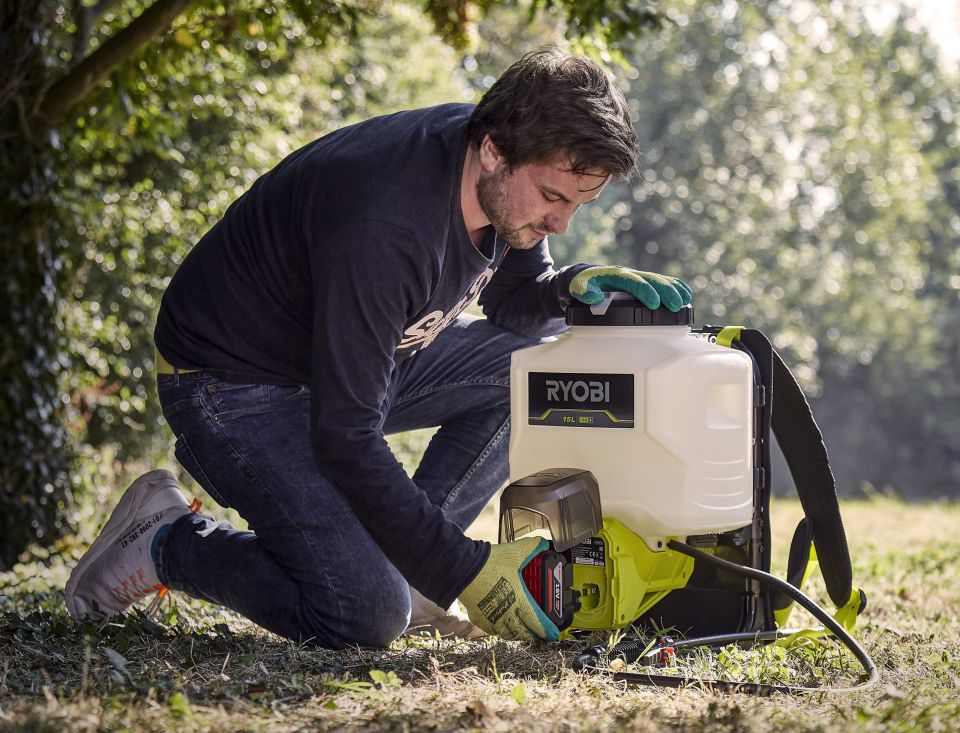 Inserting Badaptor into weed sprayer